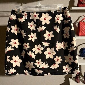 Groovy Girls black floral A-line short skirt Satin lined zip Size L